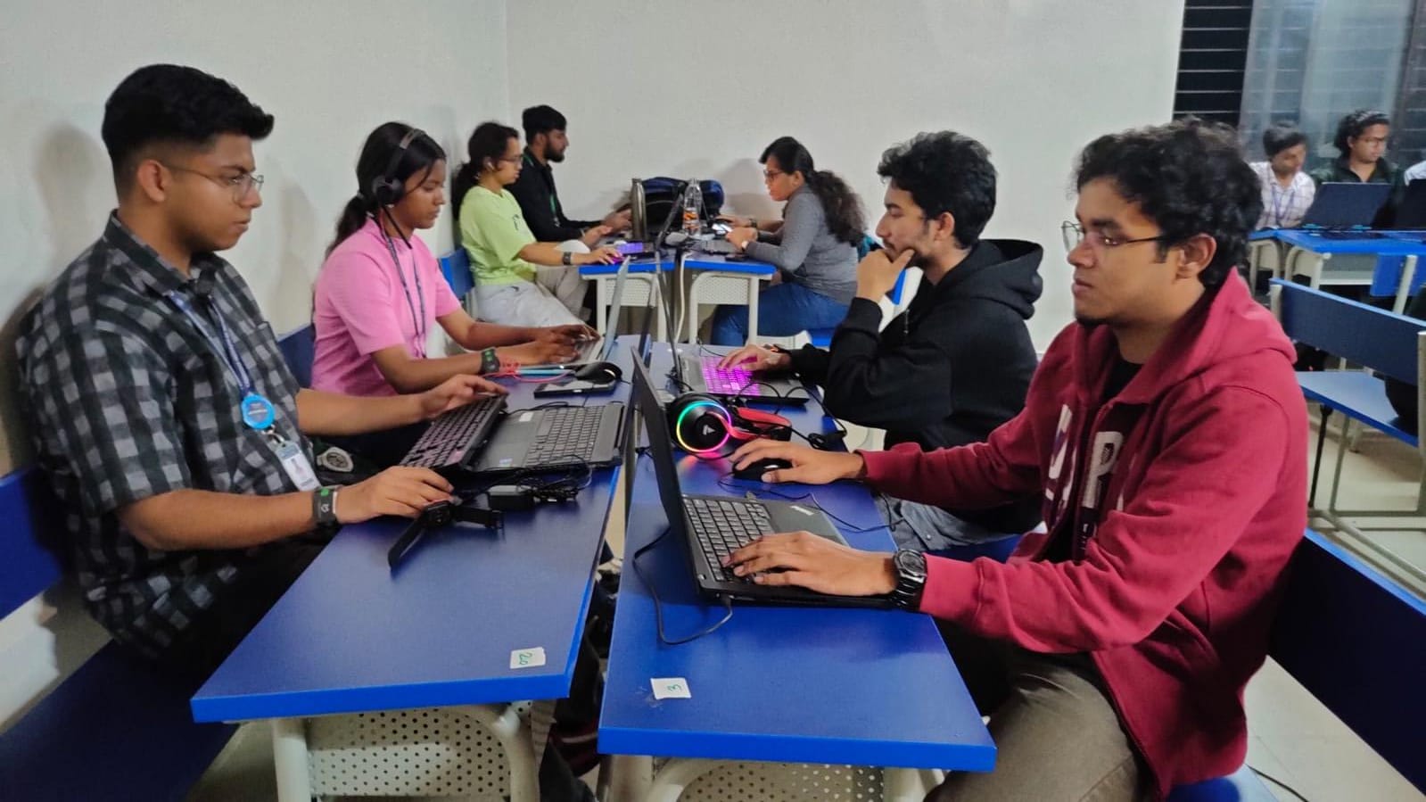 Hackathon - People collaborating at computers